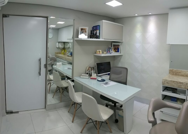 Foto 3 de Dentista Dra Sheridan Periodontia - Tratamento de Gengiva - Mau Hálito