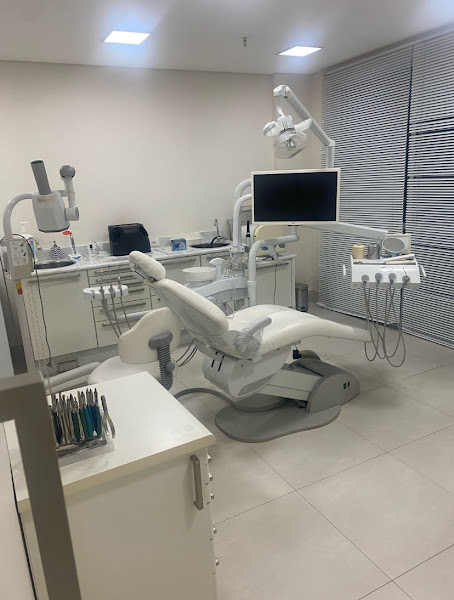 Foto 2 de Dr. Angelo Checone - Implantes dentários | Odontologia especializada.