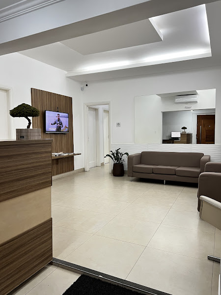 Foto 2 de Dr Sandro Taira Camba - Ortodontia - Invisalign - Implantes - Periodontia - Lentes Cerâmicas - Reabilitação