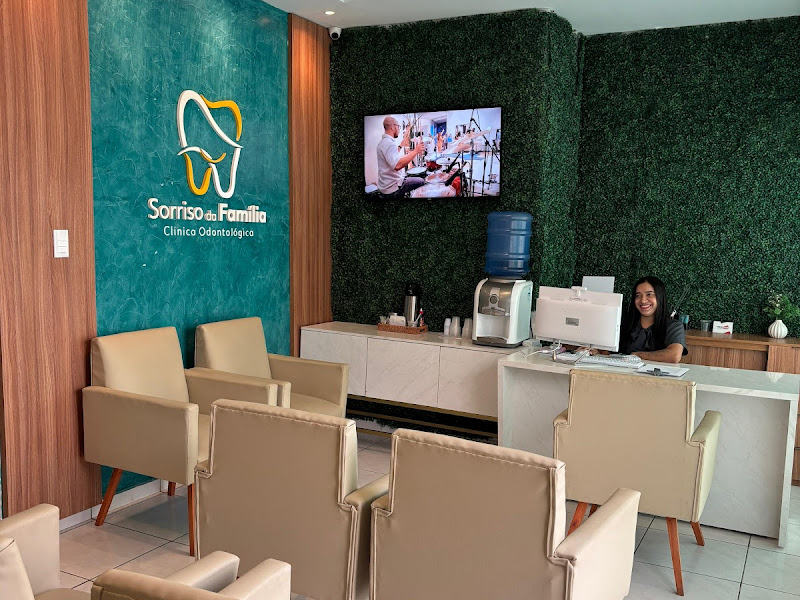 Foto de Sorriso da Família Clinica Odontológica
